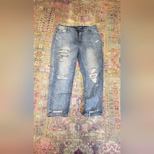 Distressed blue jeans
